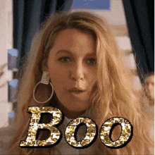 a woman with the word boo written on it