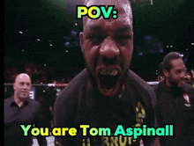a man with his mouth open and the words " you are tom aspinall " on the bottom