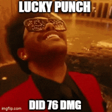 a man wearing sunglasses and a red suit says lucky punch