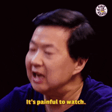 a man in a blue shirt says it 's painful to watch .
