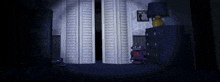 a dark room with a lamp and a robot