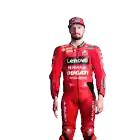 a man in a red lenovo ducati motorcycle suit