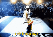 a man is dancing in front of a crowd with the words this is soup boy