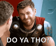 a man with a beard is smiling while talking to another man with the words do ya tho on the bottom