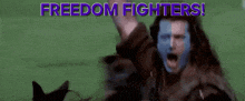 a blurry picture of a man with a blue face and the words " freedom fighters "