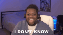 a man wearing headphones says " i don 't know "