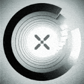 a black and white circle with a x in the center