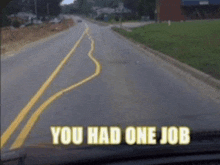 a picture of a road with the words " you had one job "