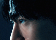 a close up of a man 's face with a watermark that says ' a '