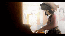 a girl is playing a piano in front of a crowd of people