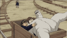 a polar bear is laying on a man in a wooden cart