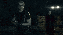 a man and a woman are standing next to each other in a video game .