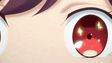 a close up of a person 's eyes with a diamond in the center