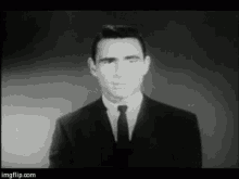 rod serling smiling pointing tongue out