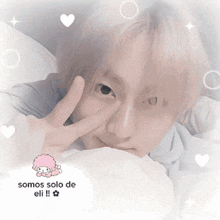 a picture of a person with the words somos solo de eli written on the bottom