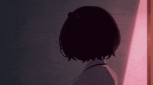 a silhouette of a girl standing in a doorway