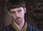 a close up of a man 's face with the caption lord-aldhelm-gifs