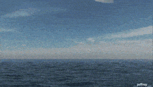 a red circle with a hexagon in the middle of the ocean