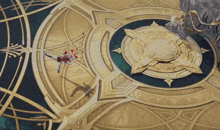 a person is laying on the floor in front of a large circular design
