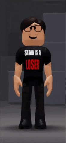 a roblox character is wearing a black shirt that says satan is a loser