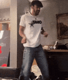 a man wearing a shirt that says smo on it