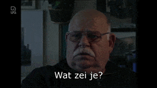 a man with glasses and a mustache is asking what zei je