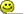 a close up of a yellow smiley face with headphones on a white background .