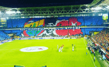 a soccer field with a large banner that says fenerbahce