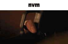a close up of a woman 's face with the word nvm above her