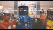 a blurred image of a room with a blue bag in the middle