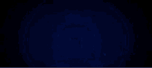 a blue circle of lights is floating in the air