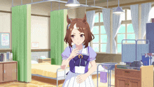 a girl with a horse head is standing in a hospital room with green curtains