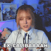 a woman wearing headphones says " ex-calibaaah "