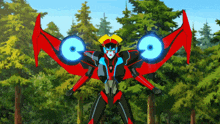a red and black robot with a blue circle on its wings is standing in a forest