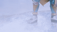 a person wearing a pair of ice cream cones is standing on ice