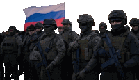 a group of soldiers are standing in front of a flag