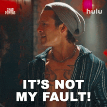 a man says it 's not my fault in front of a hulu logo