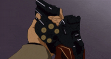 a person is holding a gun with the number 11 on the side