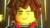 a close up of a lego figure with a smile on his face