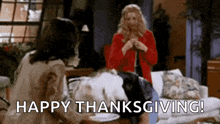 a group of women are sitting on a couch in a living room with the words `` happy thanksgiving '' written above them .