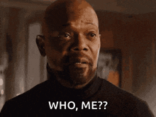 a man with a beard and mustache is asking who me ?