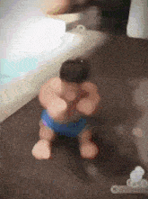 a toy man in blue shorts is standing on the floor in a bathroom .