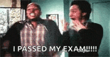 a couple of men are standing next to each other and one of them is saying `` i passed my exam ! ''