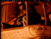a painting of a person sitting in a car with the letters ii and iii on the bottom