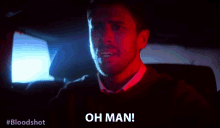 a man sitting in a car with his eyes closed and the words oh man above him