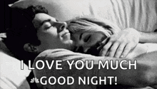 a man and a woman are hugging each other in bed .
