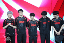 a group of young men wearing shirts that say funplus phoenix stand together