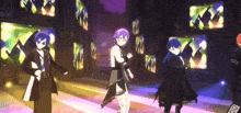 a group of anime characters are dancing on a stage in front of a wall of monitors