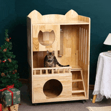 Wooden Cat House Price GIF