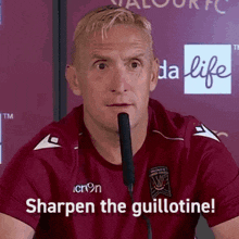 Sharpen-the-guillotine Footballer GIF